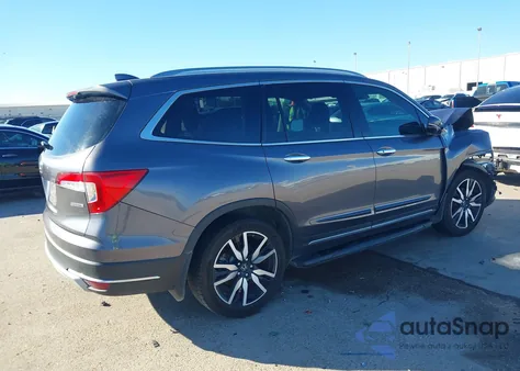 2020 Honda Pilot 2Wd Touring 8 Passenger z USA, uszkodzony, nr VIN 5FNYF5H97LB007227